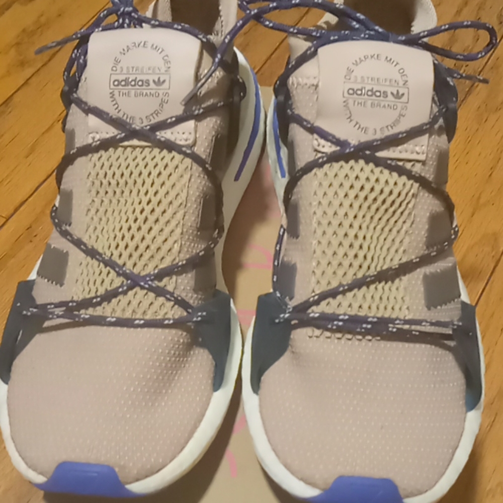 A pair of authentic Adidas sneakers